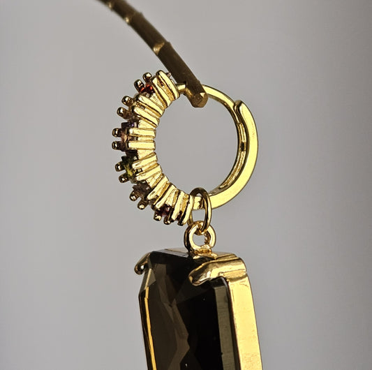 Orecchini fango e nude