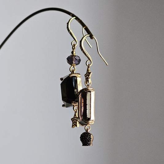 Orecchini strass viola nero e bell