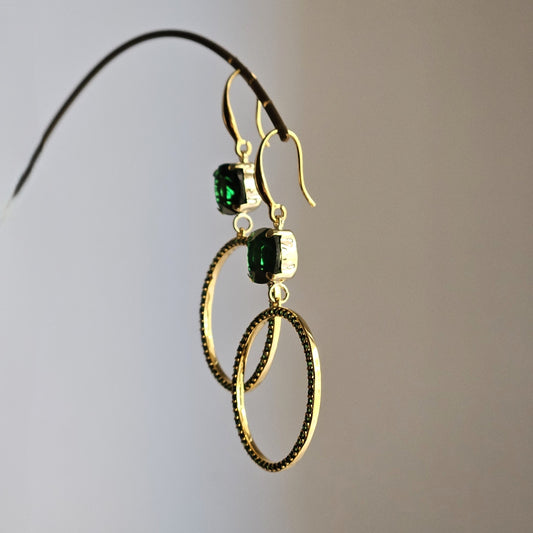 Orecchini cerchio magico e strass smeraldo