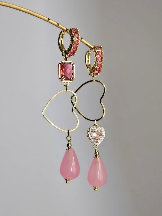 Orecchini due cuori in rosa