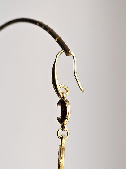 Orecchini arabesco lune glitterate e strass