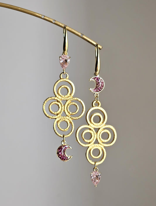 Orecchini arabesco lune glitterate e strass