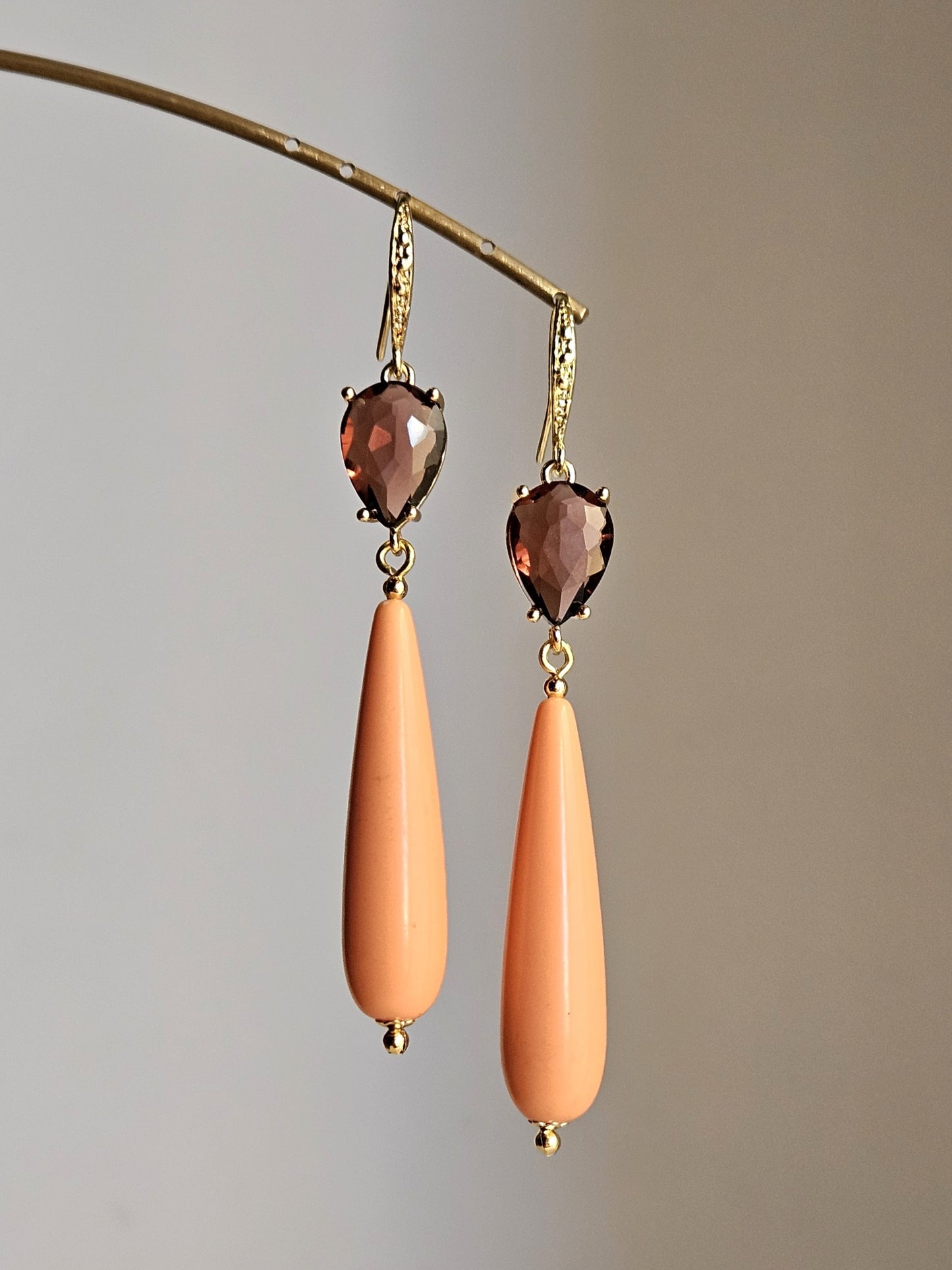 Orecchini pesca e vino