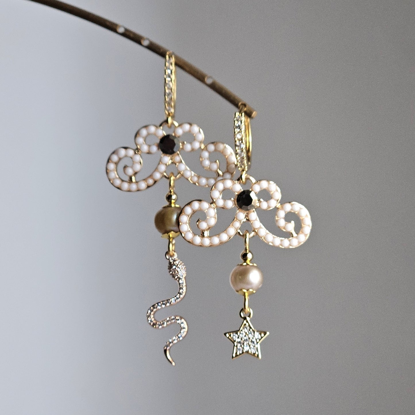 Orecchini arabesco snake e stellina