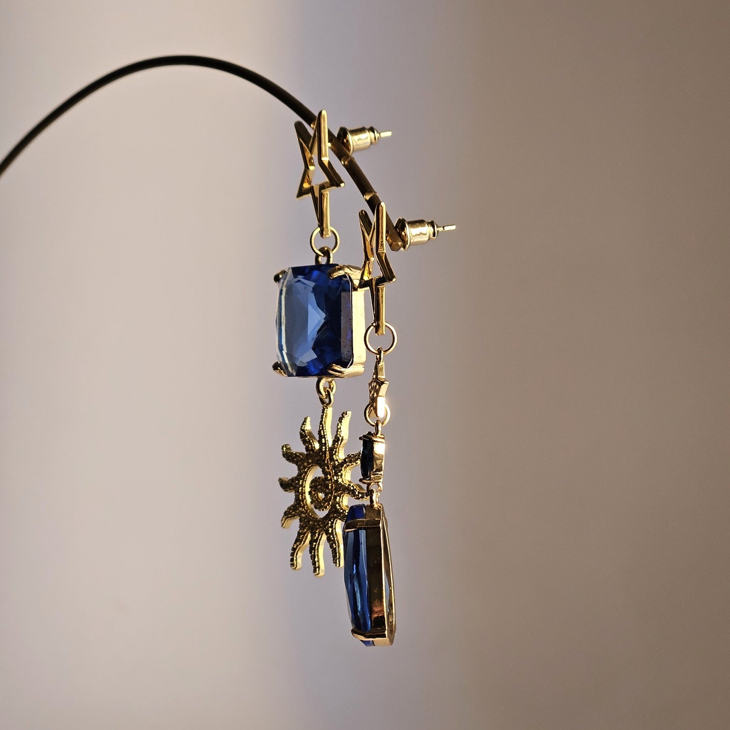 Orecchini stelle sole e strass blu