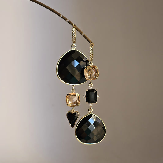 Orecchini strass in nero e oro