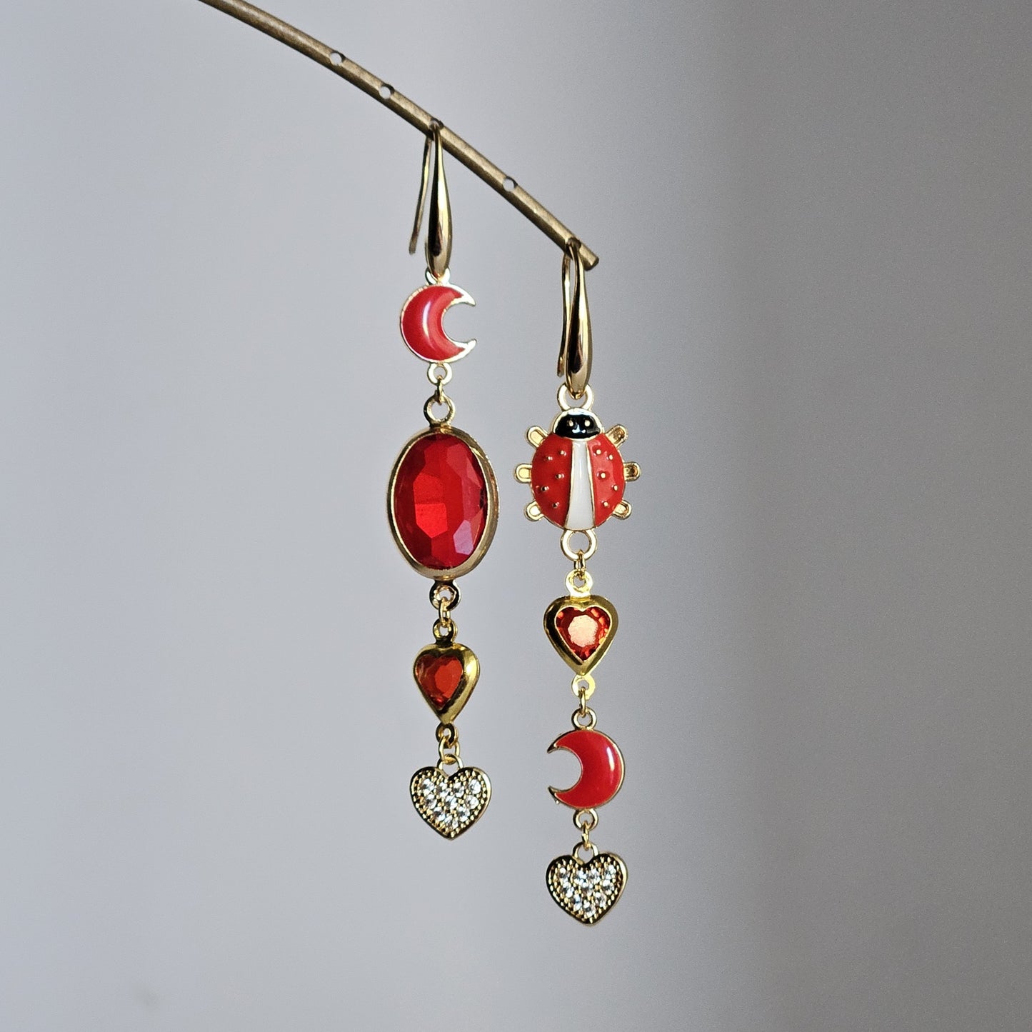 Orecchini rosso di cuore e coccinella