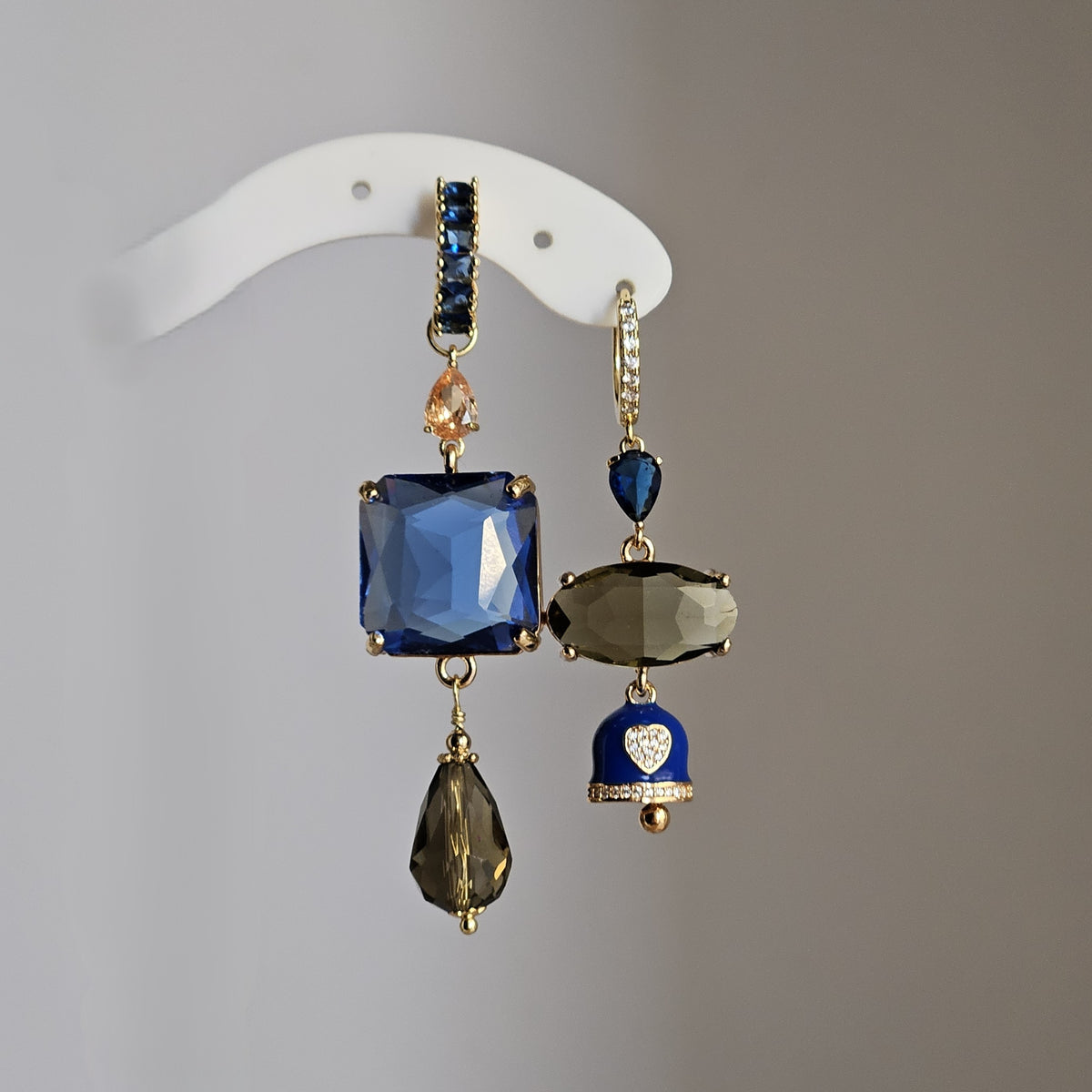 Orecchini fango blu e bell