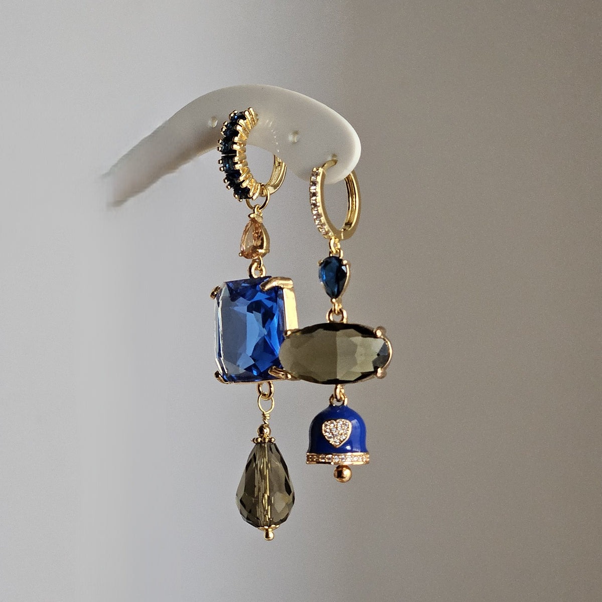 Orecchini fango blu e bell