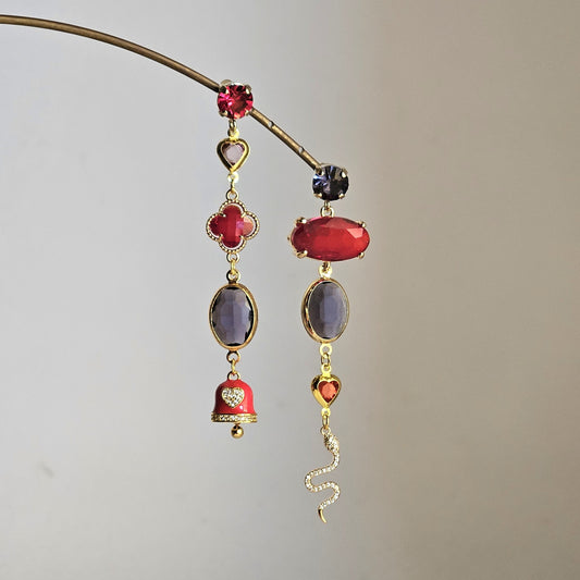 Orecchini Zehra rosso e viola - con punti luce -