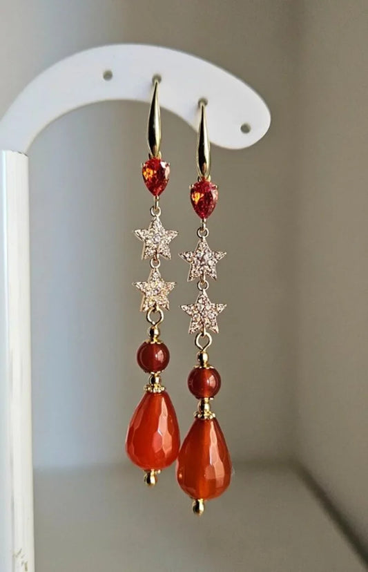 Orecchini tangerine e stelle